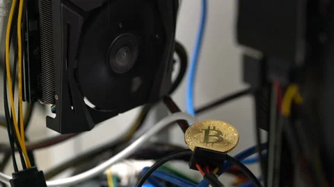 Bitcoin on the background of a graphics card in a rack for crypto-currency 스톡 동영상 86770973