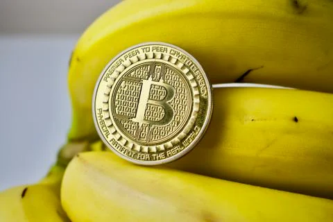 Bitcoin on banana Stock Photos