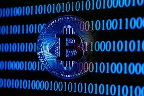 Bitcoin with binary code Foto stock
