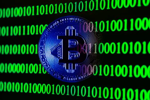 Bitcoin with binary code Stock Photos