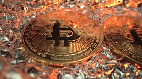 Bitcoin - Bit Coin Btc. Macro Coins lie before halving after mining. Future Stock Footage 129606376