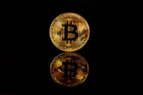 Bitcoin on black background. Bitcoin concept, Blockchain technology Stock Photos