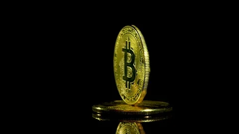 Bitcoin on black background front shoot rotate loop  360 Video stock 86789061