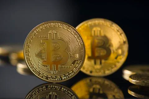 Bitcoin with black background Stock Photos