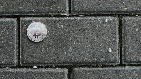 Bitcoin on brick wall Fotos de archivo