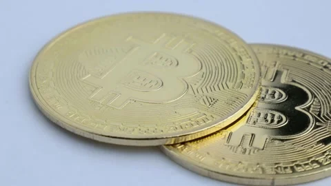 Bitcoin BTC coins on white background close-up. Virtual money online payment Stock Footage 170853630