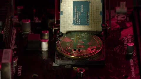Bitcoin BTC, CPU central processor on digital technology computer motherboard 库存影片 149109669