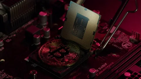 Bitcoin BTC, CPU central processor on digital technology computer motherboard Stock Footage 149110811