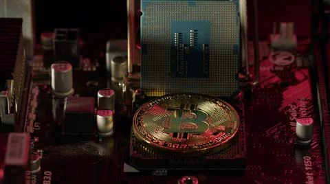 Bitcoin BTC, CPU central processor on digital technology computer motherboard 스톡 사진