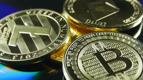 Bitcoin Btc, Ethereum Eth And Litecoin Ltc Coins Stock-Footage 121896445