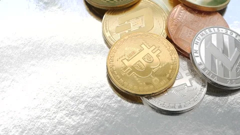 Bitcoin BTC, Ethereum ETH, Ripple XRP, Litecoin coins rotating, payment system Stock Footage 97308932