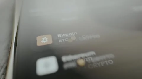 Bitcoin BTC logo within a digital user interface Stock Footage 330250277