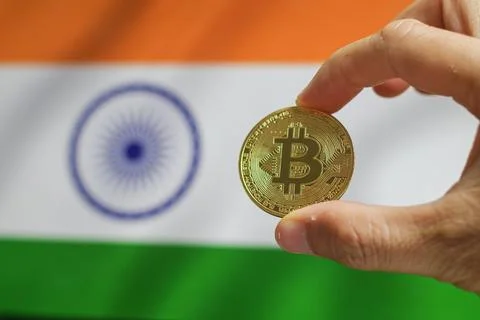 Bitcoin BTC on stack of cryptocurrencies with India flag in background. The.. Stock Photos