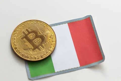 Bitcoin BTC on stack of cryptocurrencies with Italy flag in background. The Stock Photos