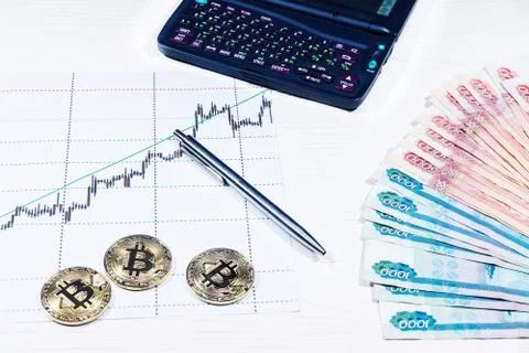 Bitcoin on the chart Stock Photos