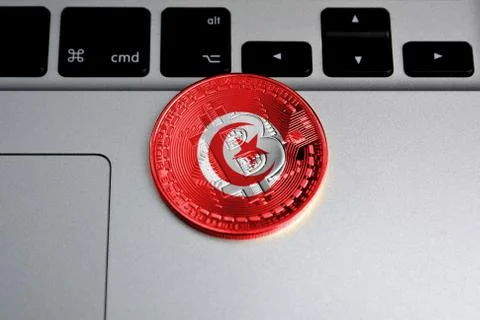 Bitcoin close-up on keyboard background, the flag of Tunisia is shown on bitcoin Illustrazione stock
