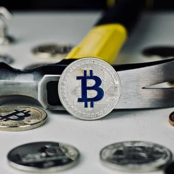 Bitcoin Coin and hammer Stock Photos
