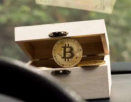 Bitcoin coin in the box, concept Stock Photos