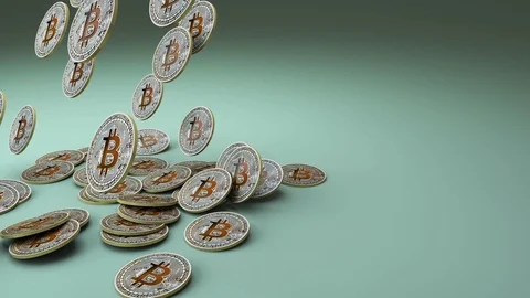 Bitcoin coin cascade on green background Stock Footage 100622986