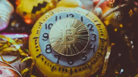 Bitcoin coin on a clock Stock Photos