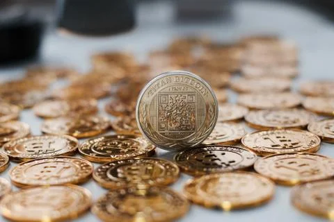 Bitcoin coin on gold coins Stock Photos