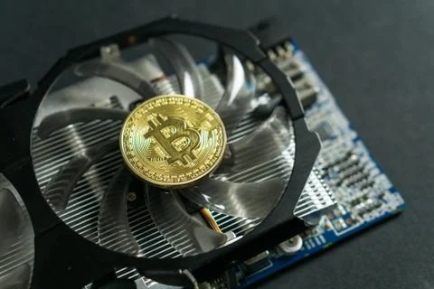 Bitcoin coin on GPU, Cryptocurrency Mining Using Graphic Cards Stock Photos