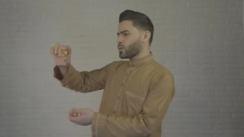 Bitcoin coin in the hands of an man. Camera in 4 K. Stock Footage 87834305