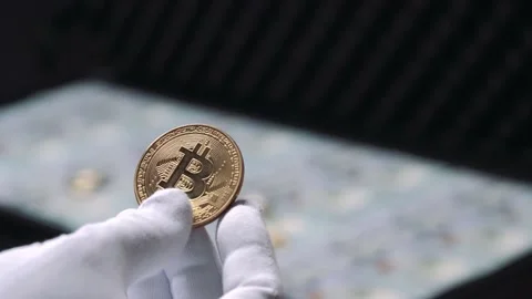 Bitcoin coin in human hands close up Video stock 172360000