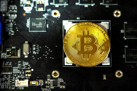 Bitcoin coin is included instead of microprocessor. The electronic board Foto stock