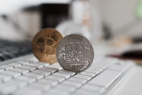 Bitcoin coin on the keyboard Foto stock