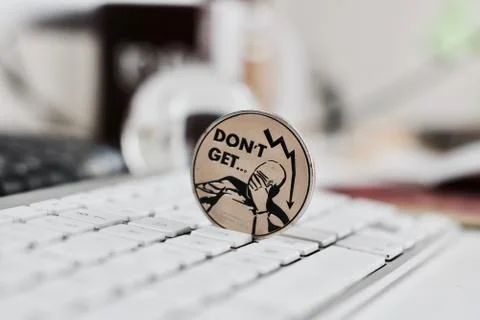 Bitcoin coin on the keyboard Stock Photos