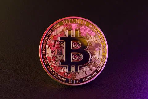 Bitcoin coin in neon lighting. Concept of digital money. Stock Photos