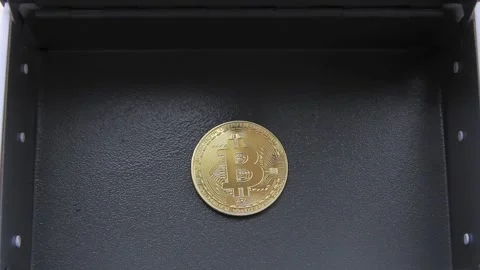 Bitcoin coin in a safe close-up. Stock-Footage 150649185