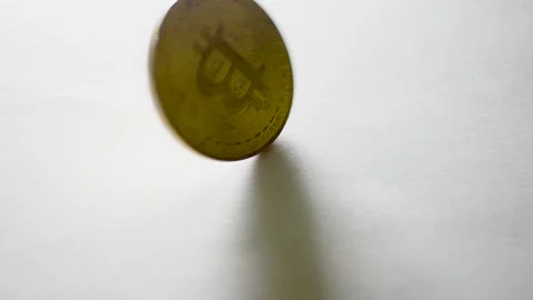 Bitcoin coin spinning on surface Stock Footage 315013081