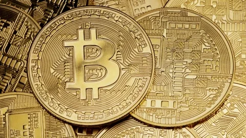 Bitcoin coin stack with intricate circuit designs, symbolizing financial Stock Footage 312656118