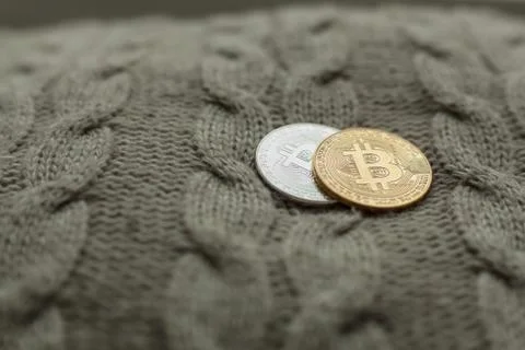 Bitcoin coin on a wool background Foto stock