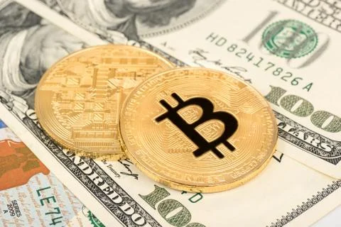 Bitcoin coins with dollars Stock Photos