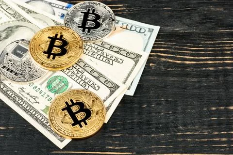 Bitcoin coins with dollars Stock Photos
