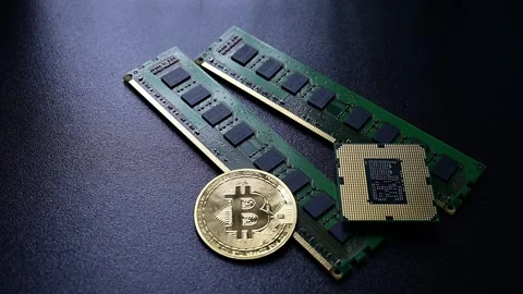 Bitcoin coins placed beside computer hardware representing crypto mining 스톡 동영상 331188689