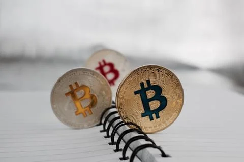 Bitcoin - colored cryptocurrency Stock Photos