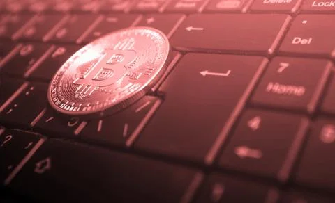 Bitcoin on a computer keyboard (landing crypt, exchange, investment, training Fotos de archivo
