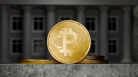 Bitcoin on a concrete background. Stack of bitcoin coins. Stock Footage 258131363