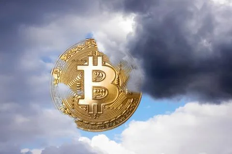 Bitcoin covered by clouds Stock Photos