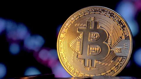 Bitcoin crypto on the abstract blurred background Stock Photos