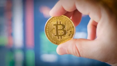 Bitcoin Crypto Currency Coin Token Internet Decentralized Money Holding Stock Footage 89878685