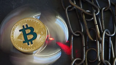 Bitcoin Crypto Currency, rotating mirror surface, red laser and chain. Stock Footage 88085628