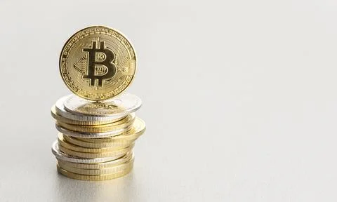 Bitcoin cryptocurrency background with copy space. Group of stacked crypto coins Stock Photos