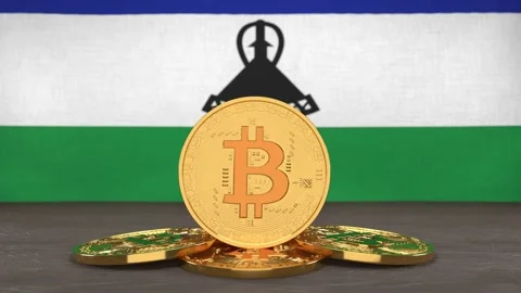 Bitcoin cryptocurrency on the background of the flag of Lesotho Stock Footage 166152072