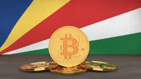 Bitcoin cryptocurrency on the background of the flag of Seychelles Video stock 166152152