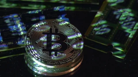 Bitcoin cryptocurrency BTC and computer components Stock-Footage 77508297